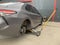 Car in a car service, repair of wheels. Concept: tire fitting, vulcanization, tire change. Car on a jack, changing wheels. Kiev