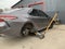 Car in a car service, repair of wheels. Concept: tire fitting, vulcanization, tire change. Car on a jack, changing wheels. Kiev