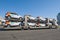 Car carrier loaded with new cars of the Delimobil car sharing company