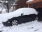 Car covered in snow