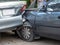 Car crash accident on street with wreck and damaged automobiles. Accident caused by negligence And lack of ability to drive. Due t