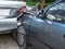 Car crash accident on street with wreck and damaged automobiles. Accident caused by negligence And lack of ability to drive. Due t