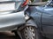 Car crash accident on street with wreck and damaged automobiles. Accident caused by negligence And lack of ability to drive. Due t