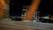 Car crossing city bridge at night, Manhattan, New York City, USA, slow motion