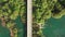 Car crossing road bridge over Mreznica river in Croatia, overhead shot of countryside landscape