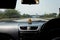 Car dashboard with empty expressway look through car windshield
