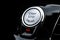Car dashboard with focus on engine start stop button. Modern car interior details. start/stop button. Car inside. Ignition remote