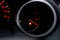 The car dashboard shows the flue gas with red. The oil warning light is running out.Close up image of illuminated car dashboard