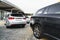 Car dealership - many vehicles parked for sale in a row