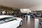 car dealership premium class, modern car dealer interior, photo with blur