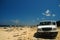 Car on desert beach Bonaire