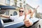 Car driver happy giving thumbs up - driving couple