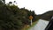 Car drives past a kiwi road sign in nz