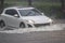 Car driving flood water, it`s raining heavily hard, Some of the flooded