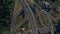 Car driving on freeway overpass. Aerial view car traffic on roundabout highway