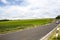 A car is driving on the national road in the countryside of Germany