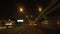 Car driving point o view of busy highway at night. street lights
