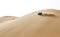 Car driving in Rub al Khali Desert at the Empty Quarter, in Abu