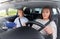 car driving school instructor and young driver