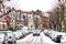 Car driving through a terraced street covered with snow around West Hampstead area in London