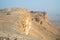 Car on the edge of the Jabal Tuwaiq Mountains, with desert below landscape, Riyadh, Saudi Arabia