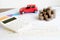 Car expenses calculate with notes and toy car