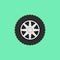 Car flat wheel with tire vector icon on green background