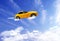 Car flying on blue sky background.