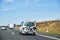 Car on the freeway 20 with a bike carrier attached to the stern and a bicycle mounted on it