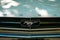 Car front design detail and FORD MUSTANG logo / brand name clos