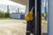 Car gas station. Yellow fuel gun.