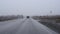 Car glass is cleaned by wipers in wet weather, sleet and rain