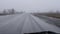 Car glass is cleaned by wipers in wet weather, sleet and rain