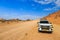 Car on gravel road, Damaraland, Namibia