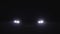 Car headlight blinking in Dark. Sports car Headlight. Switching of car LED headlights in night