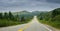 Car on a Highway through coastal Foothills of Newfoundland.