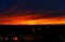 Car illuminates the roadway in this scenic twilight landscape sunset