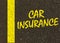 Car Insurance written on the road.