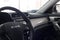 Car interior. Modern car illuminated dashboard. Luxurious car instrument cluster