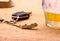 Car key with accident and beer mug