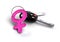 Car keys with female icon keyring. Concept for women drivers or car owners