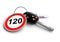 Car keys with speed limit road sign on keyring.