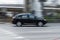 car Lexus RX Third generation AL10 is driving on city road with blurred background