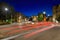 Car light trails on the crossroad during night in the city of Um