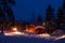 Car Lights in a Winter Forest Camping