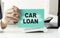 car loan concept with text,calculator and credit card and car key