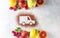 Car made of cocoa powder and citrus fruits on a light background. Online shopping. Healthy nutrition, strengthening immunity. The