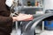 Car mechanic grinds a car part in handicraft in a service station - Serie car repair workshop
