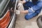 Car mechanic is inspecting tires and replacing worn tires through long hours of work, car repairs, car breakdowns, punctured tires