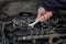 Car mechanic repair diesel engine using spanner tool